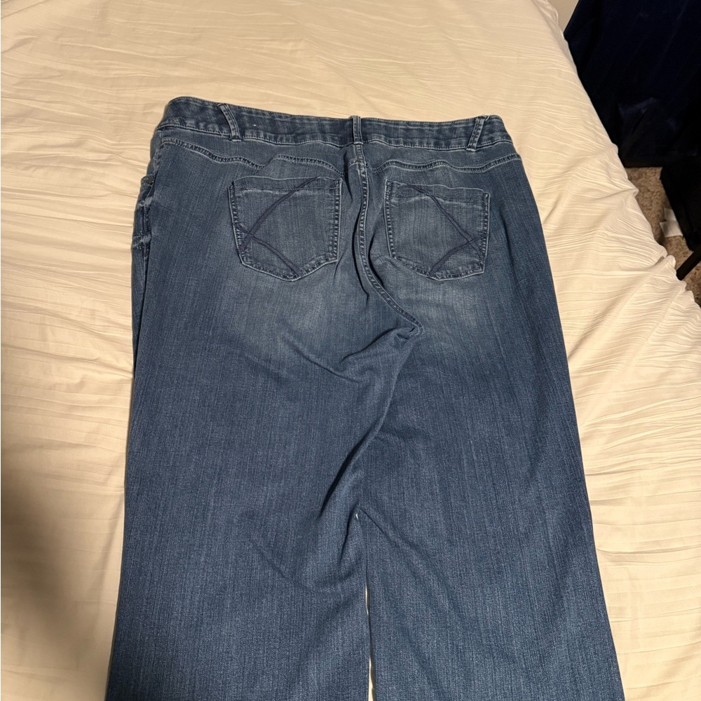 Blue jeans with darkk blue embroidery